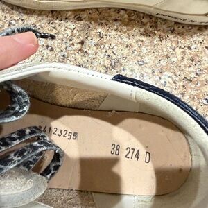 Golden Goose Cream and Black Sneakers